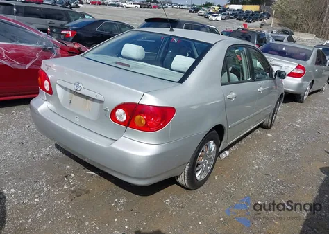 2003 Toyota Corolla Le z USA, uszkodzony, nr VIN 2T1BR38E23C108775